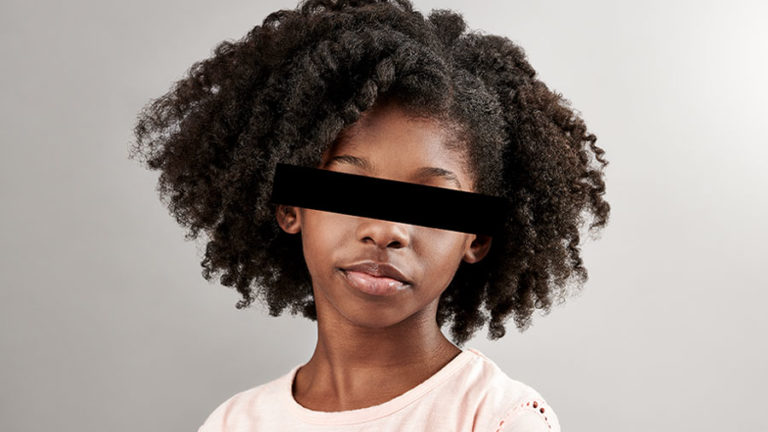 african american young girl with black bar over eyes