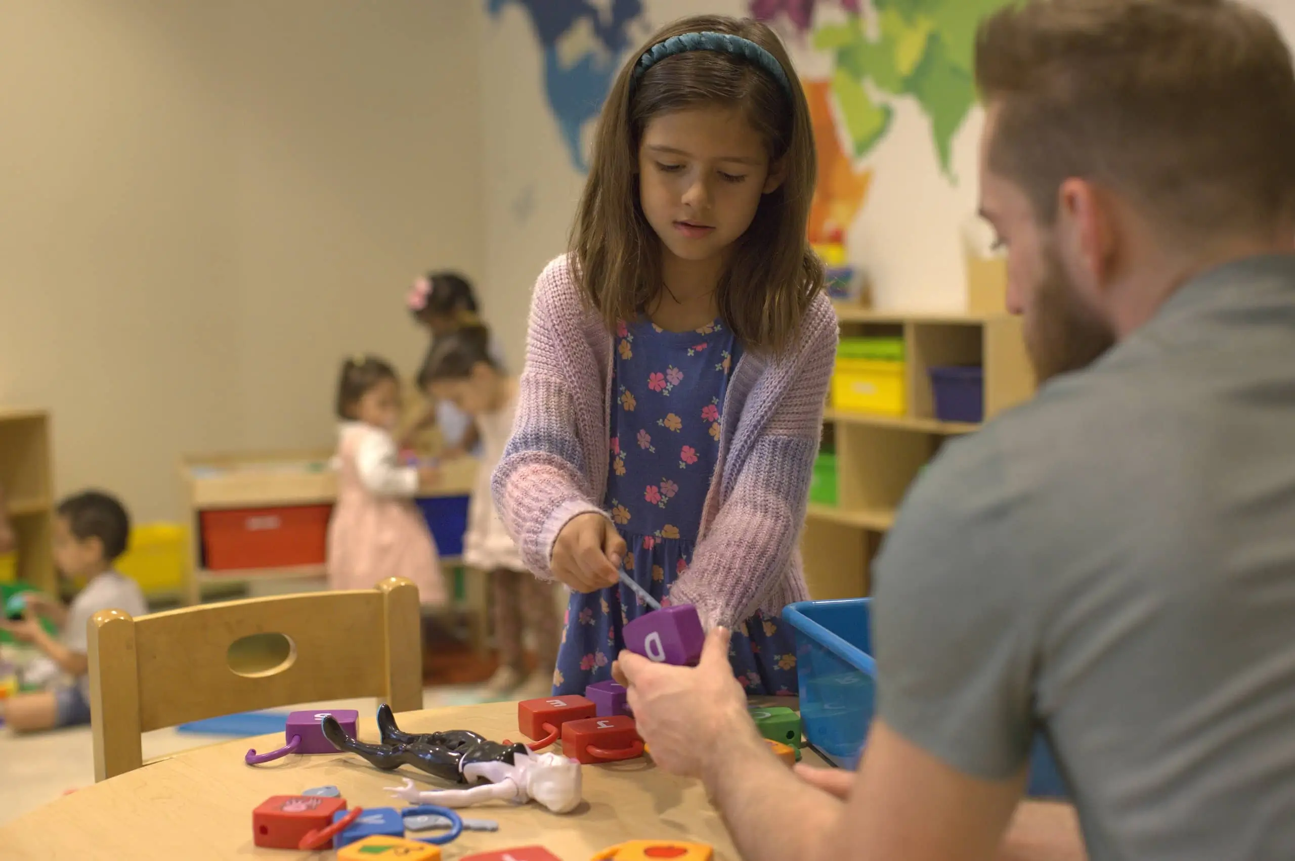 DCAC Approach Children Playing Indoors